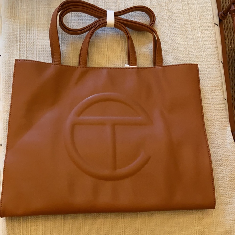 Large tan Telfar shopping bag tote. Never used.
